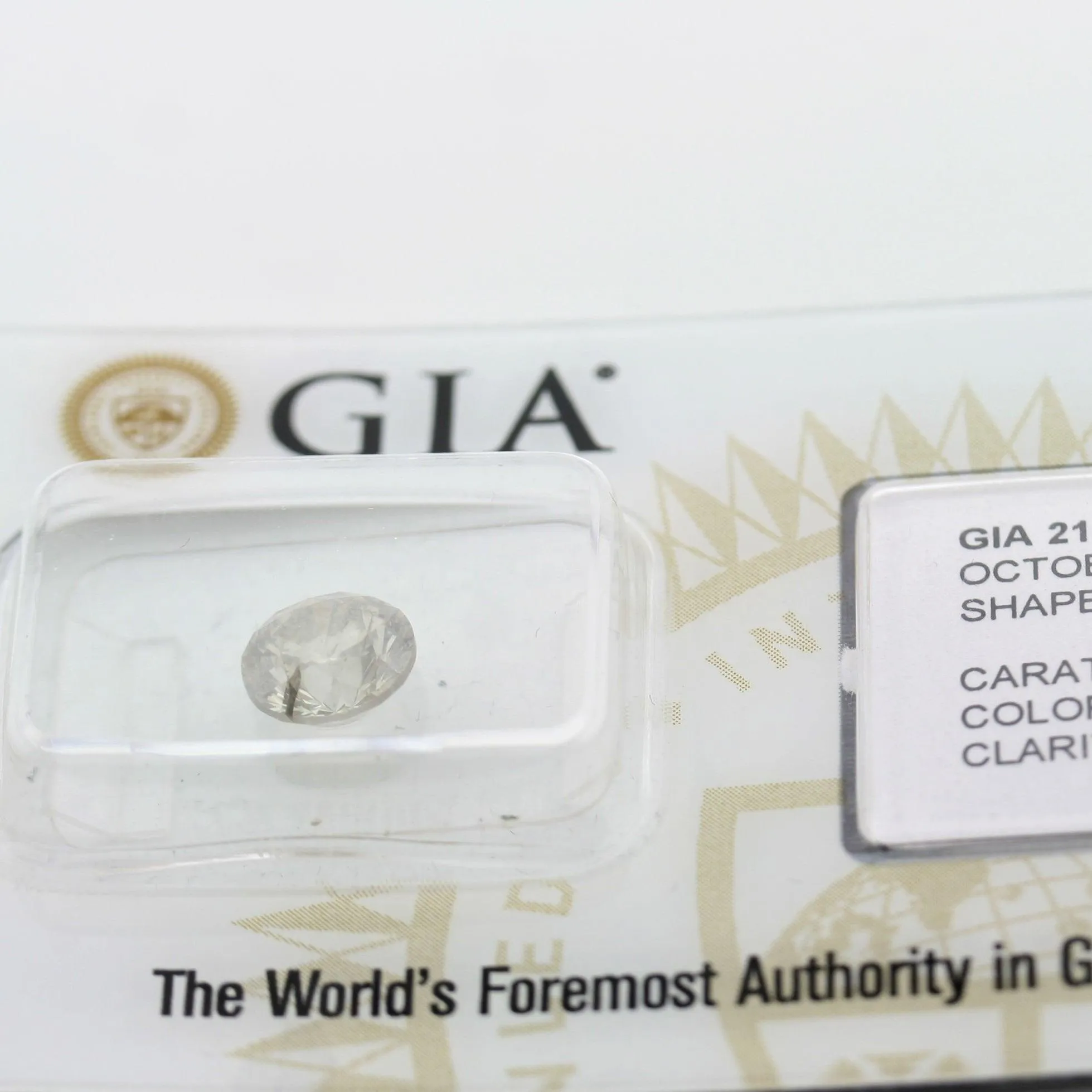 GIA Graded Round Fancy Champagne Diamond 1.59 Carat, I1 Clarity (2181802916)